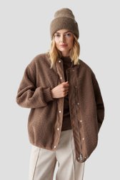 Le devant de Bonnet tricoté brun de Opus pour Femmes