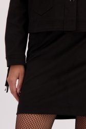 Detail van Korte zwarte rok door Louise voor Dames