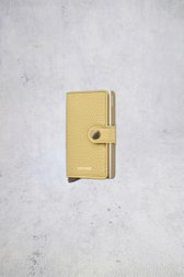 Le devant de Porte-cartes en cuir jaune - Miniwallet Pebble de Secri pour Femmes
