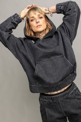 Le dos de Sweat à capuche gris effet délavé de Murielle Victorine Scherre pour Femmes