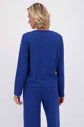 Le dos de T-shirt bleu à manches longues de Claude Arielle pour Femmes