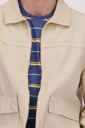Détail de Veste beige zippée de Ravøtt pour Hommes