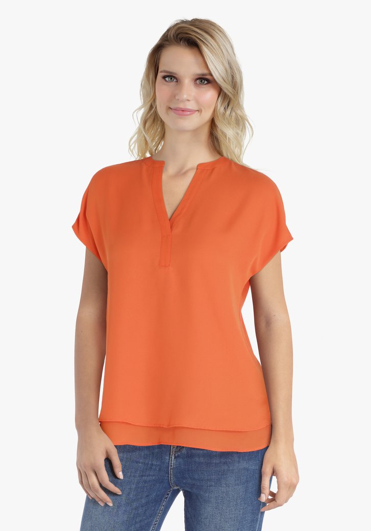 Oranje blouse met V-hals