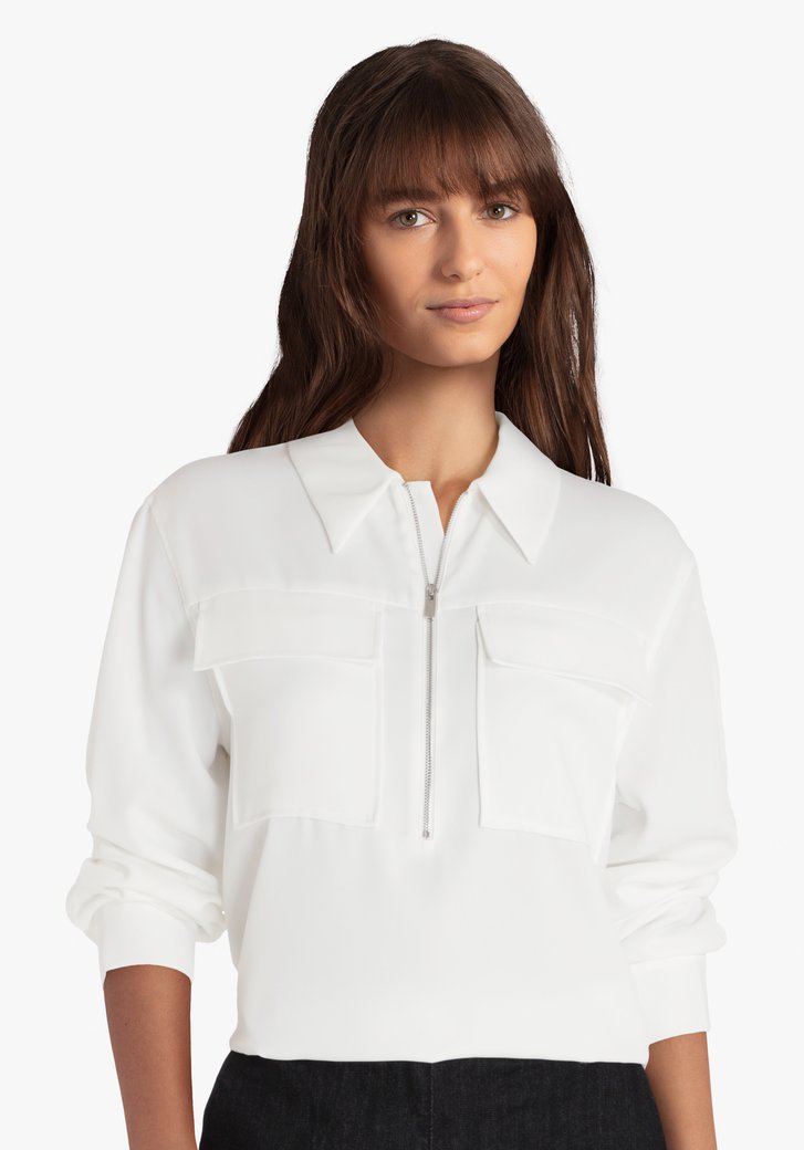 Witte blouse met korte rits